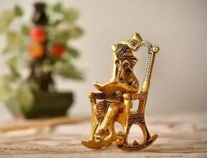 a-c-ganesh-reading-ramayana-on-chair-avighna-crafts-original-imag4s36rdn2dexj.webp
