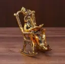Ganesha On Rocking Chair' Idol Showpiece Figurine (15 cm, Golden, Metal)